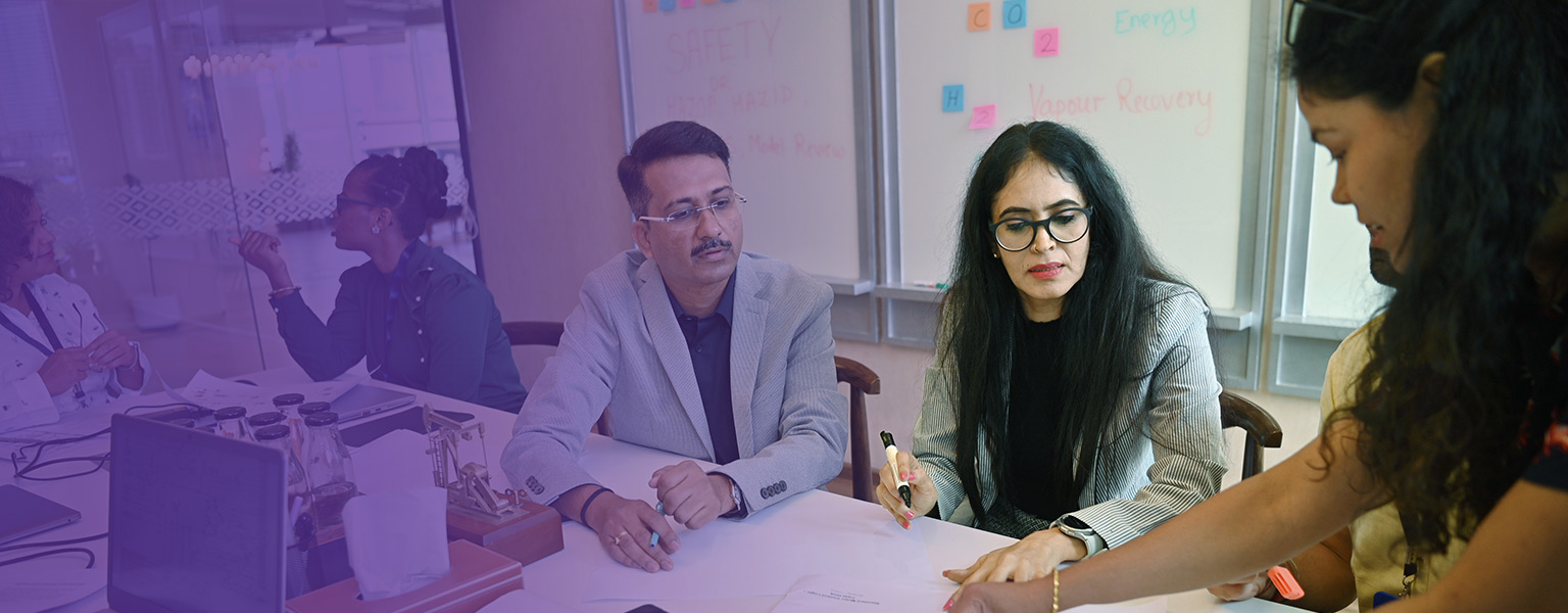 Image of business people in a conference room